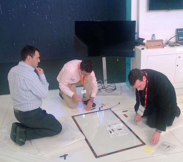 elbruno's tweet photo. Not as easy as it seems RT @Nitt2pac: @elbruno @rpinolf @RamonMiranda making tv touchable at #MWC14 @AvanadeSpain http://t.co/OeJXy08k8M