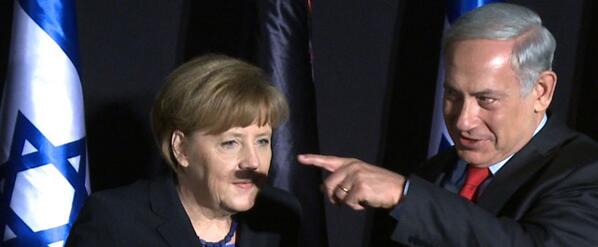 Ouch! Jerusalem Post photo of Angela Merkel with Hitler mustache shadow