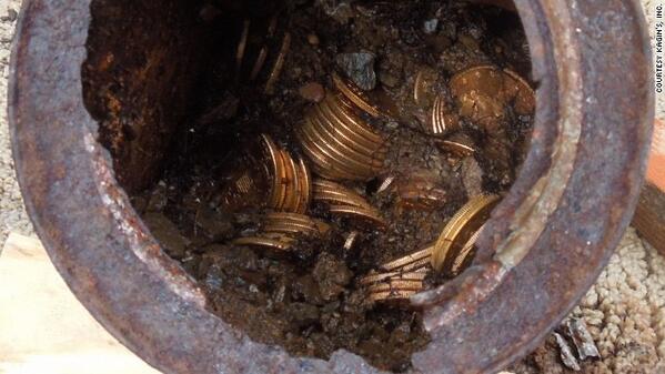 California couple digs up 8 cans on their property holding about $10 million in gold coins. cnn.it/1fS8gqz