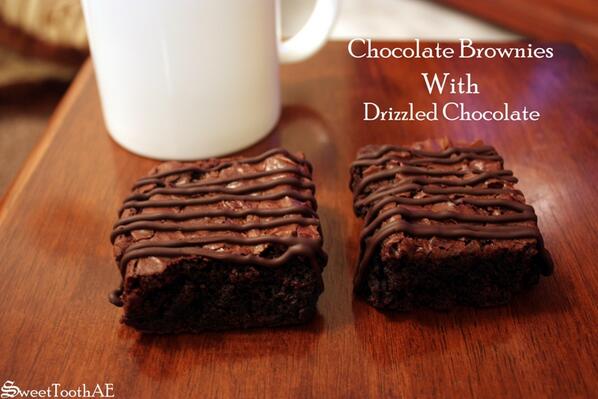 SweetToothAE's tweet image. #Chocolate #brownies with drizzled chocolate
