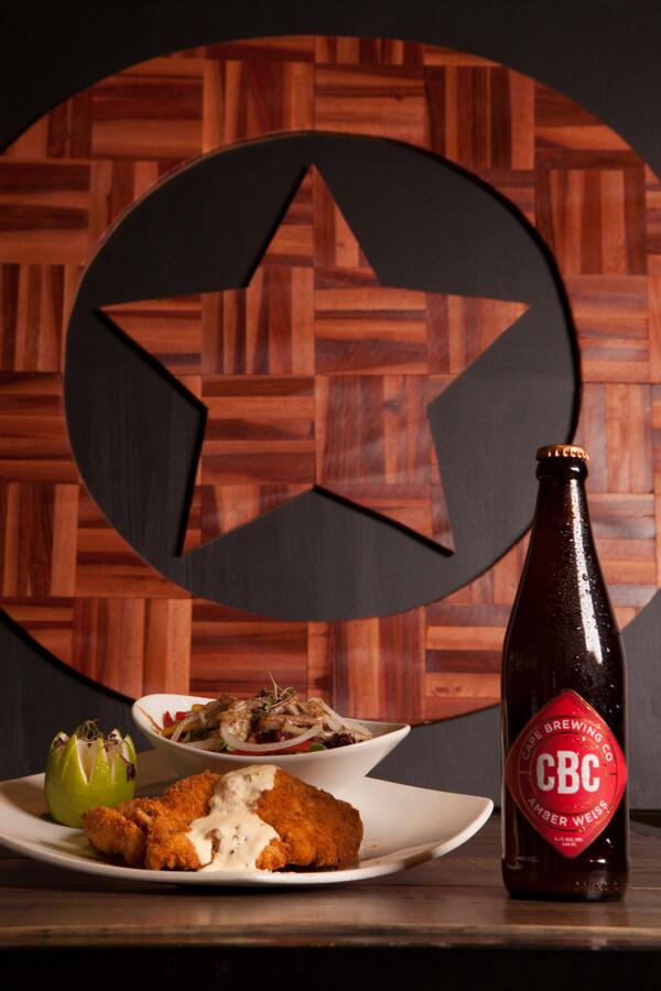 To keep us focussed til our dinner @Rocketallstars tonight- Crusted Chicken Schnitzel with <a href="/CapeBrewingCo/">Cape Brewing Co.</a> Amber Weiss