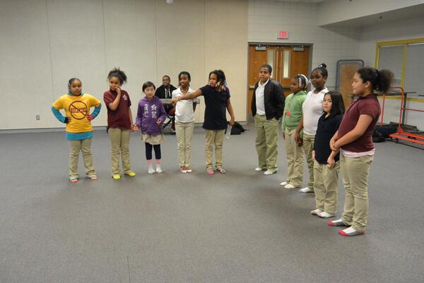 The group had to create different shapes using their bodies and WITHOUT TALKING! Here is the letter "L"