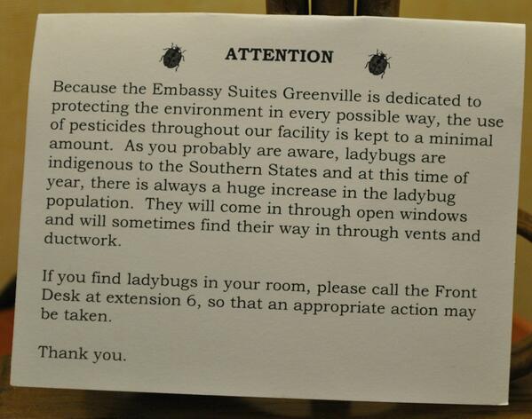 EntsocAmerica's tweet photo. Check out this ladybug warning in my hotel room at the ESA SEB meeting in Greenville, SC: #ESASEB - http://t.co/SnbcLcldD8