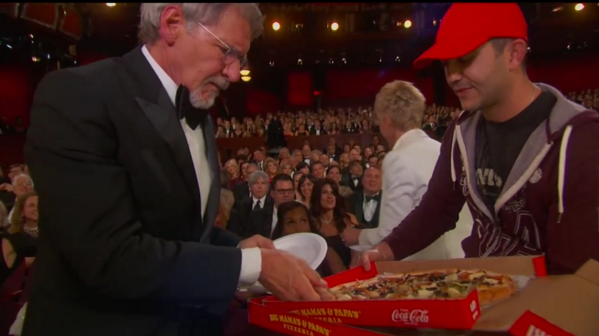 BuzzFeed's tweet photo. Harrison is super serious about his pizza http://t.co/xnXhBM22ER