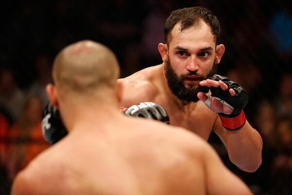 SportsCenter's tweet photo. Johny Hendricks CHAMP! Unanimous decision on three 48-47 cards as he takes down Robbie Lawler for title. #UFC171 http://t.co/2WGKBChdXE