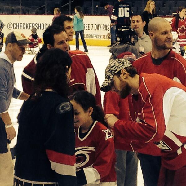 Rshandra's tweet photo. @CheckersHockey @toriashandra and Rosie skating with the players http://t.co/X6XarPZa1I