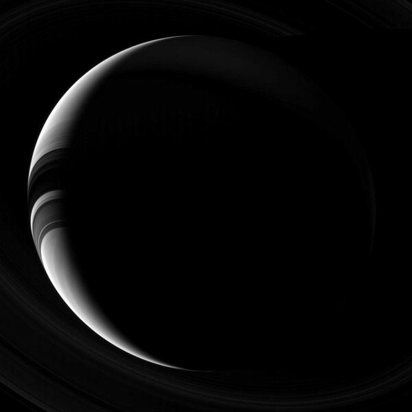 NASASolarSystem's tweet photo. New view: The serene crescent of Saturn http://t.co/1VLky0xmXD http://t.co/eIf6CwIoD5