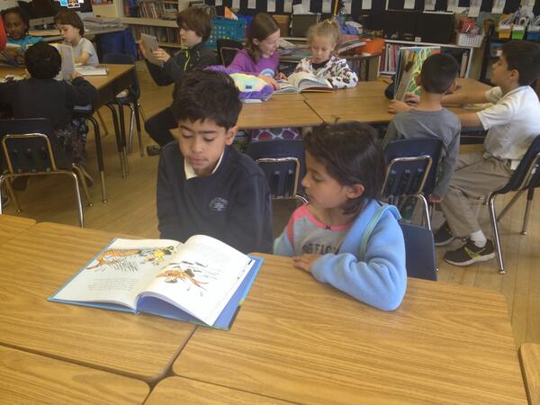 Mad4thGrade's tweet photo. Reading  Dr. Seuss books on Dr. Seuss Day http://t.co/Ifqy4gdjfA