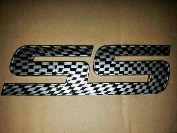 OhHydroGraphics's tweet photo. SS emblem done in silver checkered carbon fiber. http://t.co/TAZJxf1d80