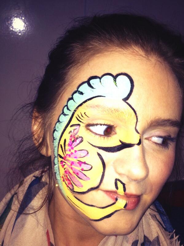GriswoldLucy's tweet photo. SXSW Interactive. Seahorse. #facepaint  #SXSW #sxswinteractive http://t.co/LMHCwJv0G4