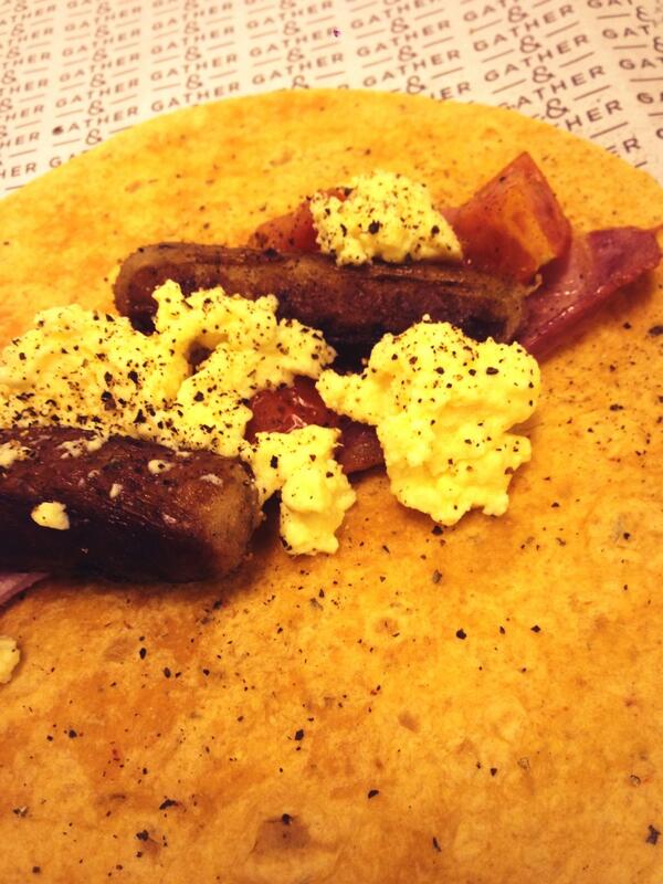 CafeIpf's tweet photo. Lincolnshire sausage vine tomato bacon and scrambled egg wrap.Ready for you now.@Gatherandgather http://t.co/AM5gDtBVhg