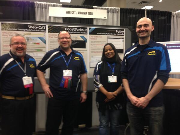 mapq's tweet image. #sigcse2014 Best Dressed Booth … or best bug fighting crew or best cat?