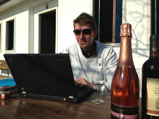 PWTorienteering's tweet photo. The coach enjoying some fine wine and working on the courses outside. It was almost +20 today. Follow the sun! http://t.co/Hb5hDjBH5l