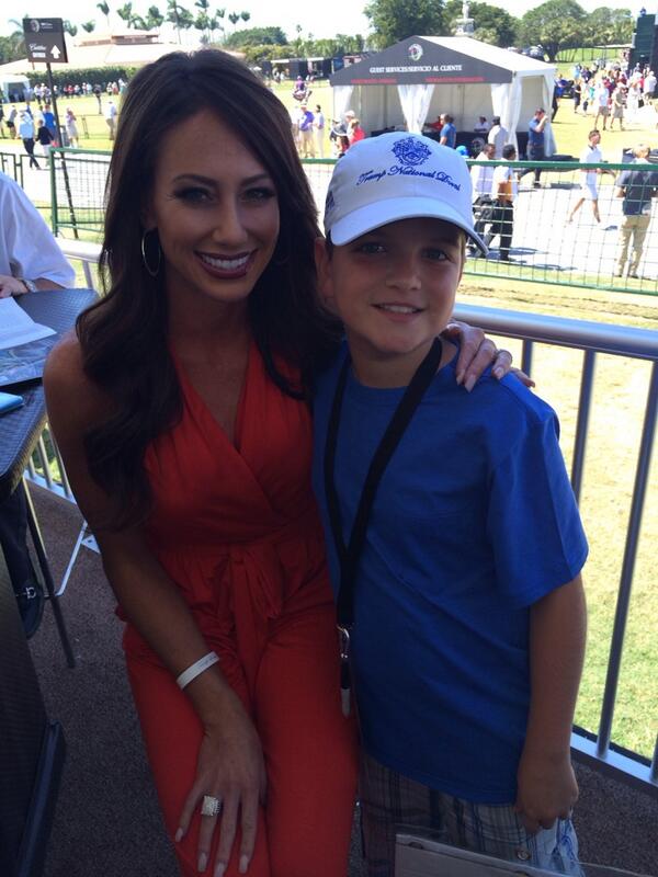 _HACKTHEPLANET_'s tweet image. "@froggyradio: My little man met @HollySondersGC today at the @CadillacChamp at @TrumpDoral. http://t.co/0Y6Y44mg4G"great picture