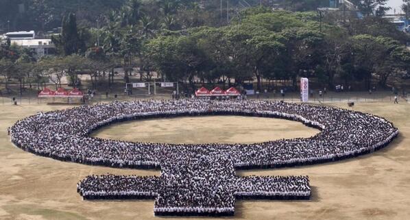 JournalistLani's tweet photo. Participants form a female symbol as part of celebrations for IWD in Manila, Philippines 8 Mar 14. #iwdpopup http://t.co/jZXlyeT7bi