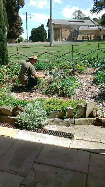 Our gardener Clement hard at it!