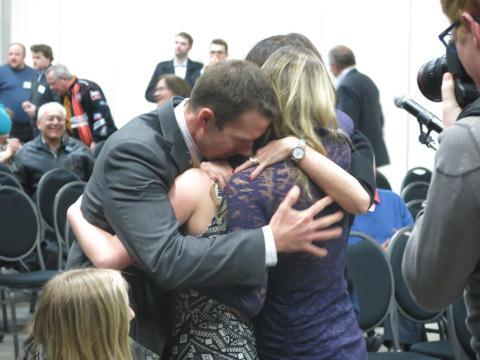 BillGraveland's tweet photo. John Barlow hugs his family after winning Conservative nomination for #Macleod byelection Saturday. #cpc #cdnpoIi http://t.co/j3ZNSYDb5P