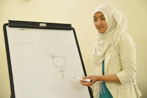 OWYP_NUSTHub's tweet photo. Literally representing #mansar as a Man with a big "sir"(head)  while playing pictionary. #Mariam #SST2014 #MyMoment http://t.co/l1epEbl3SX