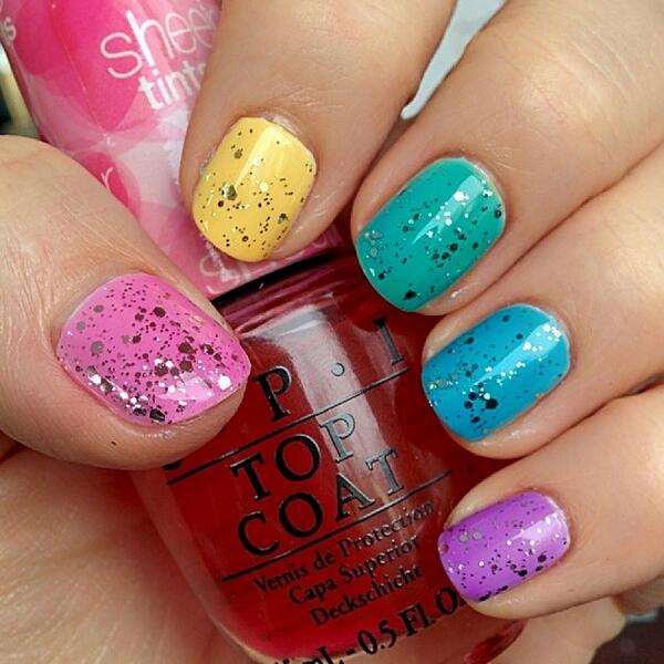 AllLacqueredUp's tweet photo. Added glitter and another layer of @opi_products #SheerTints to yesterday's #skittles #notd #manimonday http://t.co/Mn6R5IZ3hZ