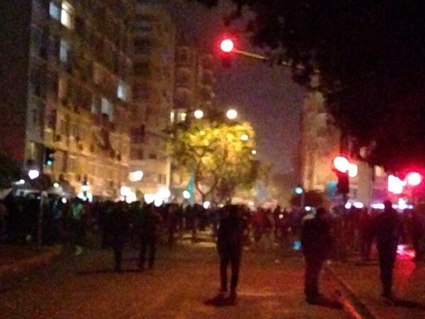 Intense clashes in #Adana. Police using tear gas, protesters not backing down. Street in rubbles, mud. #BerkinElvan