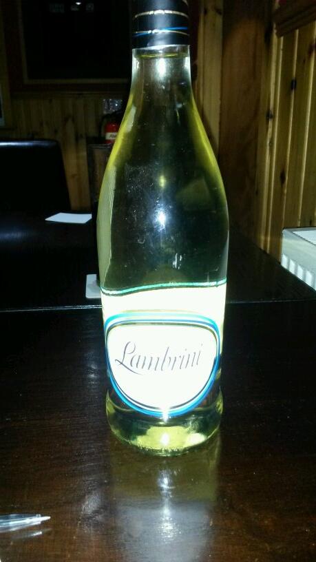 We won a bottle of wine!! This is wine, isn't it? Isnt it???? @Allan_Finnie  #lambrinigirls