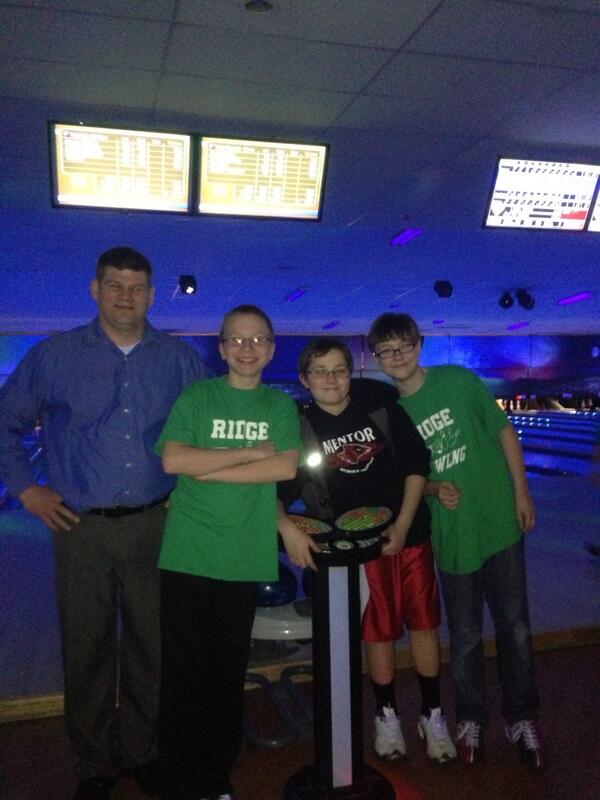 Catching up with former Bellflower students at cosmic bowling. The sixth graders showed Mr. Capel how to bowl.