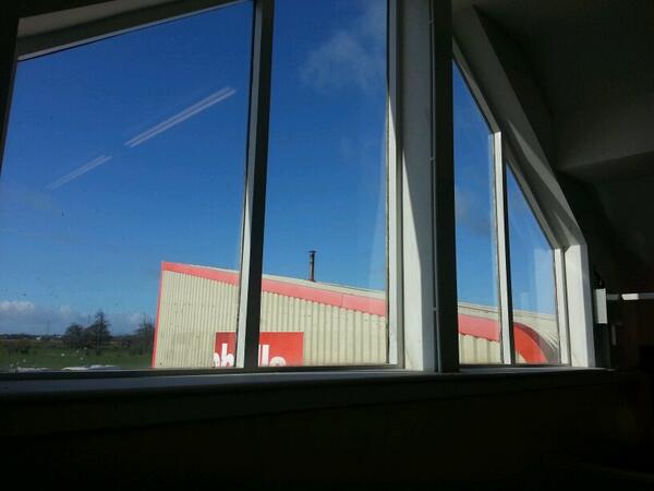 Fitting window film to office windows this morning to reduce glare and heat.