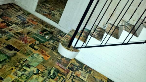 Cool floor made of pictures varnished to the floor.