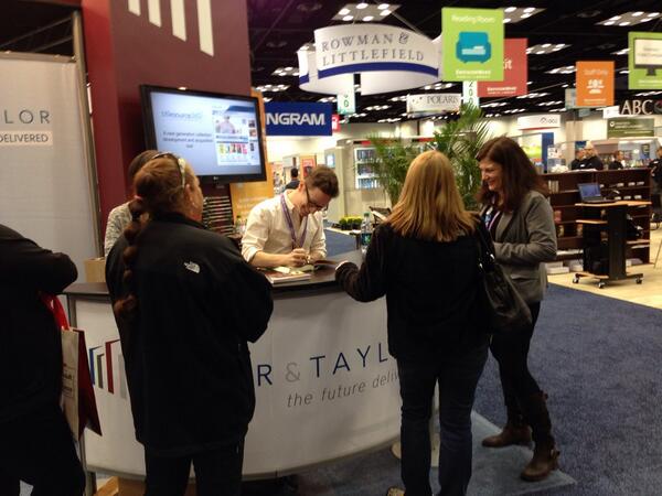 BakerandTaylor's tweet photo. Author sighting at booth 903. @EliotSchrefer signing his book Threatened. Stop by! #pla14 http://t.co/LP1nYR8r1a