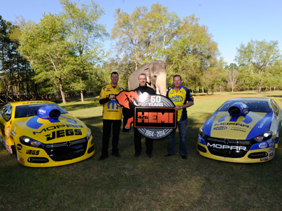NHRA's tweet photo. The big debut of @OfficialMOPAR new Dodge Dart today, they hit the track tomorrow! #GatorNats @TeamJEGS http://t.co/sCc8KMavkI