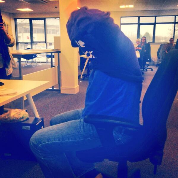 This is what happens when men try on Ladies Hoodies!! @RowanLord23 getting stuck!! #officeentertainment