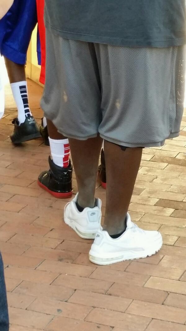LMAOTWICE's tweet photo. Either his shoes are melting up or he is ashy as hell.....LAMO in line yesterday at Six Flags http://t.co/cZAd86QlsB