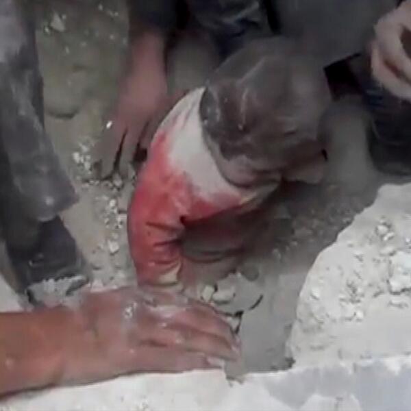 Rescued from the rubble: the strength of humanity in the face of brutality. bit.ly/1cFQQlF #c4news #WithSyria