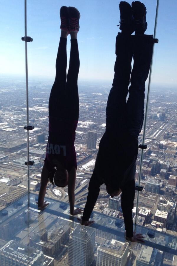 NECheerCenter's tweet photo. Just some handstands. In the sky. #NoBigDeal #NebraskaCheer #NoFear http://t.co/8xSZcMsdwL