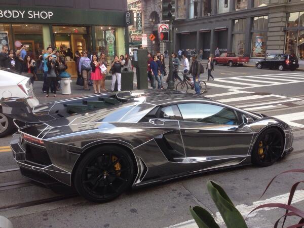 MindBlowing's tweet photo. Black Chrome "Tron" Lamborghini Aventador http://t.co/hjbf0v3xBp