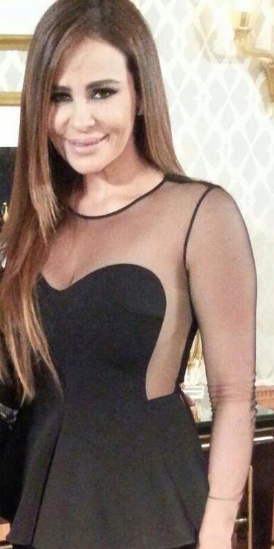 CaroleinStyle's tweet photo. @CAROLE_SAMAHA in a #stellamccartney  jumpsuit in a recent interview with Lamiss al Hadidi http://t.co/4oINiOiuJt
