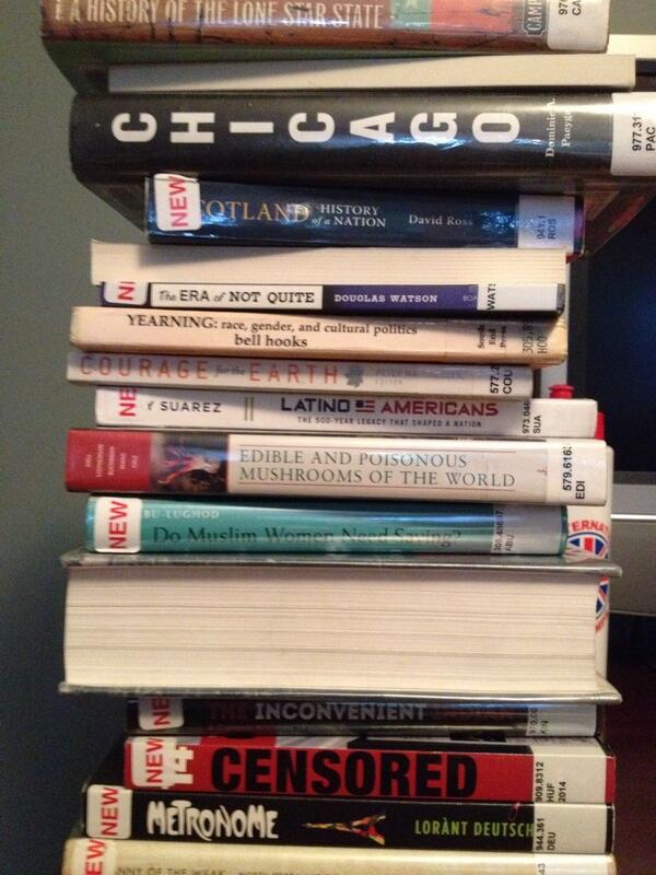 HPAHouston's tweet photo. The UK is banning #booksforprisoners. This is our #shelfie in protest—our CO's current stack of library books! http://t.co/nJz7TPFtVx
