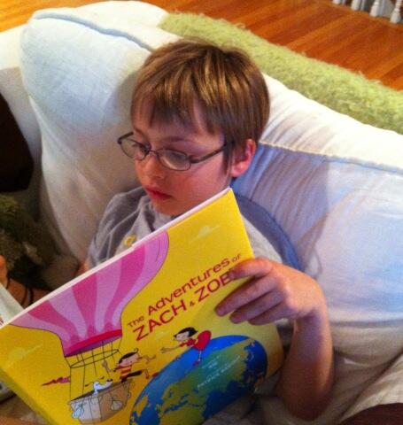 heybriandawson's tweet photo. @SigNYC @ZachZoeyPilot Will (noted on the dedication page!) enjoying "the adventure book." The kid *loves* it. http://t.co/Y3jnmcbJh8