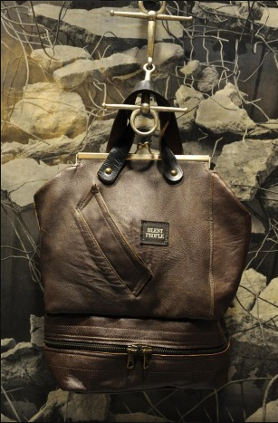 Uniquejunk's tweet image. say hello to #Barcelona! #vintage #italiandesign #handbags made from #1940sGermanpolicecoat. see coat pocket on side!