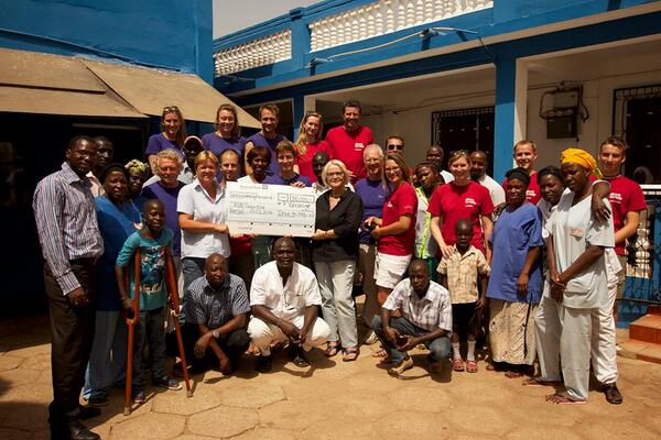 Drivetohelp's tweet image. What an adventure! The teams have arrived at the ASB clinic in The Gambia and presented the fund raising cheque.