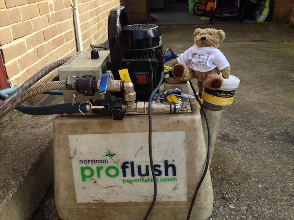 FSI_Facilities's tweet photo. Fsi bear is in charge of the power flush machine today. Keeping heating systems running at their maximum efficiency. http://t.co/8ptNbg2edK