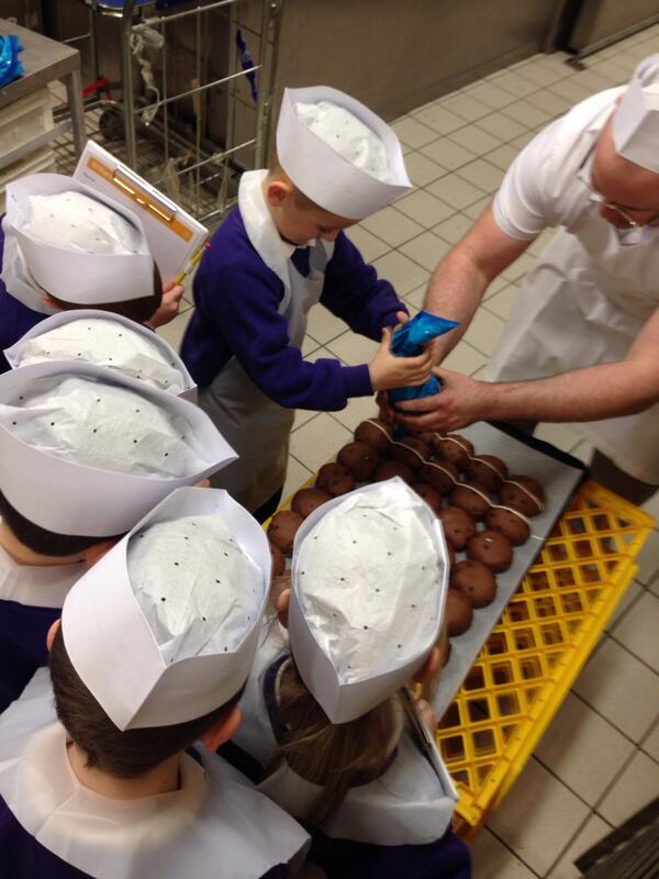 tesco2969's tweet photo. Crossing Hot Cross Buns with kids from Denbigh Primary School http://t.co/jRXjoNFebY