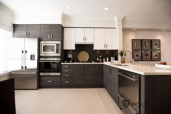 A full shot of the high end Fisher &amp; Paykel appliances kitchen at Riga Townhomes at 7691 Bridge Street #RichmondBC