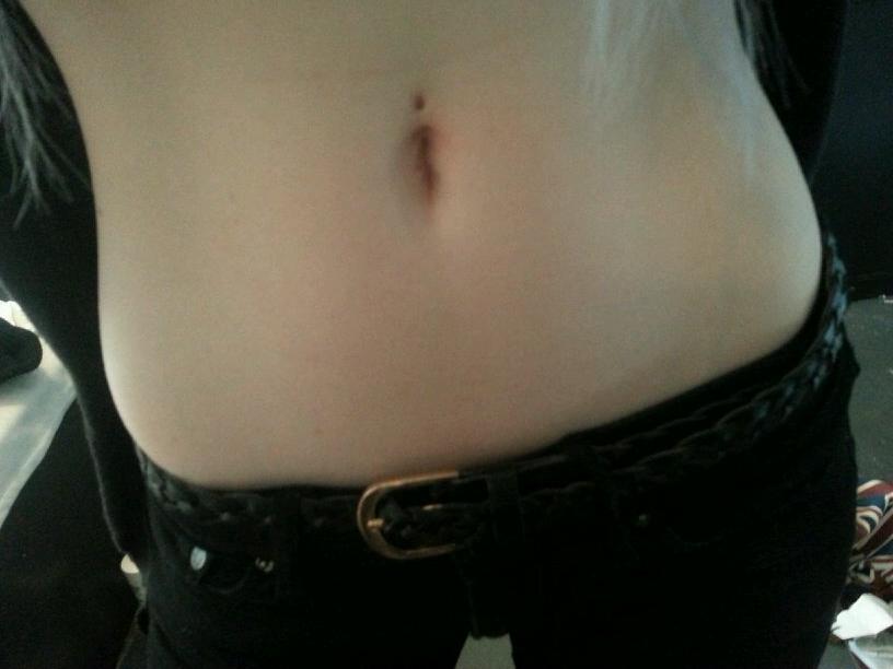 Belly button piercing without ring outlet