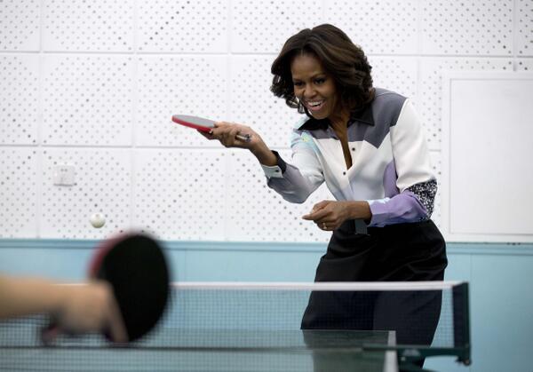 Michelle Obama begins China vacation by playing ping-pong