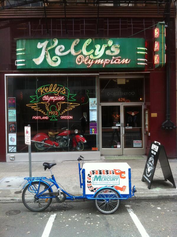 Cargo Bike Couriers delivers <a href="/portlandmercury/">Portland Mercury 🗞</a> &amp; their concert listings every week to the awesome <a href="/Kellys_Olympian/">Kelly's Olympian</a>.