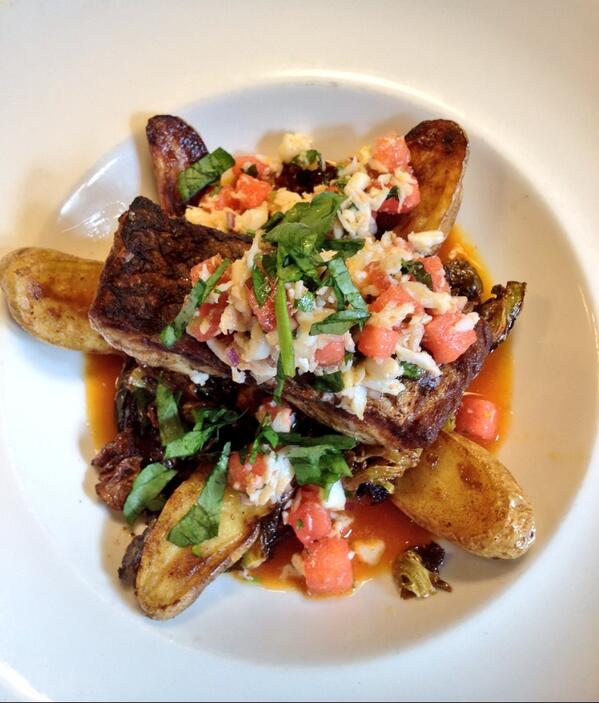 Chef is ready for #summer special. Striped bass, crab and watermelon salad