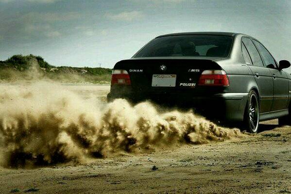 BMWPorn's tweet photo. Dinan M5 in the sand http://t.co/vfDDqch1gL