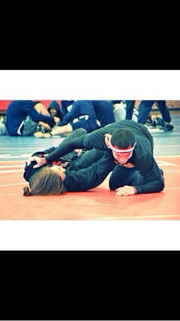 WrstCheerProbs's tweet photo. Yeah sure adorable &amp; all but uh shouldn't you be like warming up or like idk not rolling around with your girlfriend http://t.co/I9rlfMBh2o