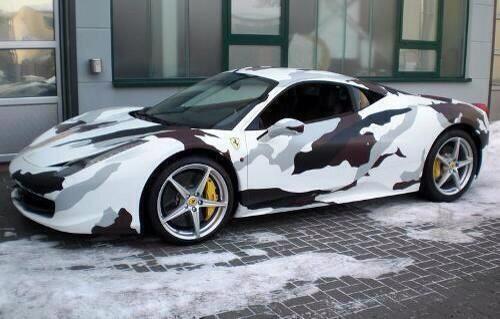 MotorPorn's tweet photo. Camo Ferrari 😍 http://t.co/s8kthc8E8s